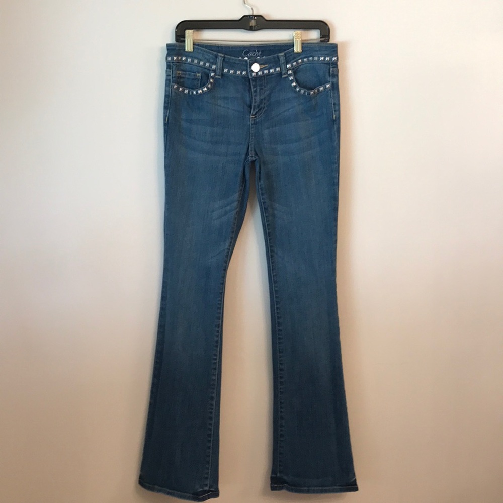 Light fade jeans with silver studs